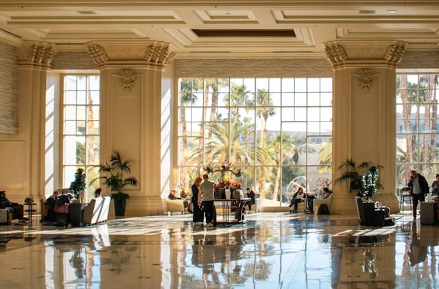 What problems can a PMS solve for hotel managers and hosts?